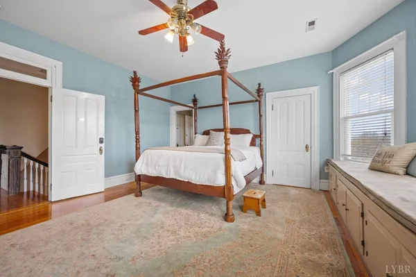 an aerial view of a house with a yard basket ball court and outdoor seating