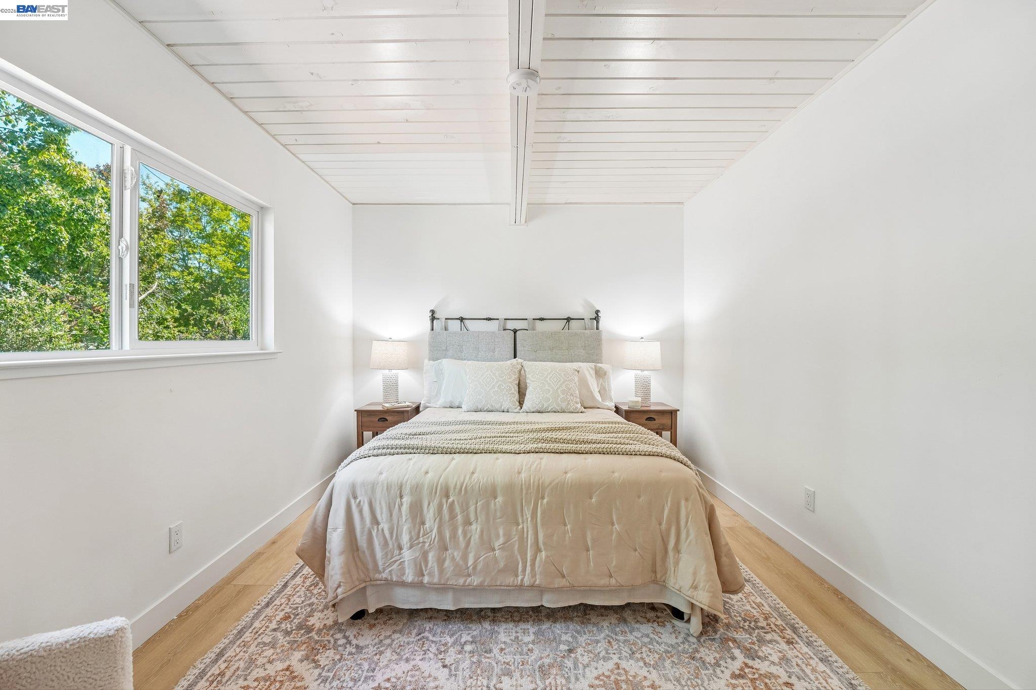 606 West 9th Street Santa Rosa, CA 95401 - Photo 43 of 52 a bedroom with a bed and a window
