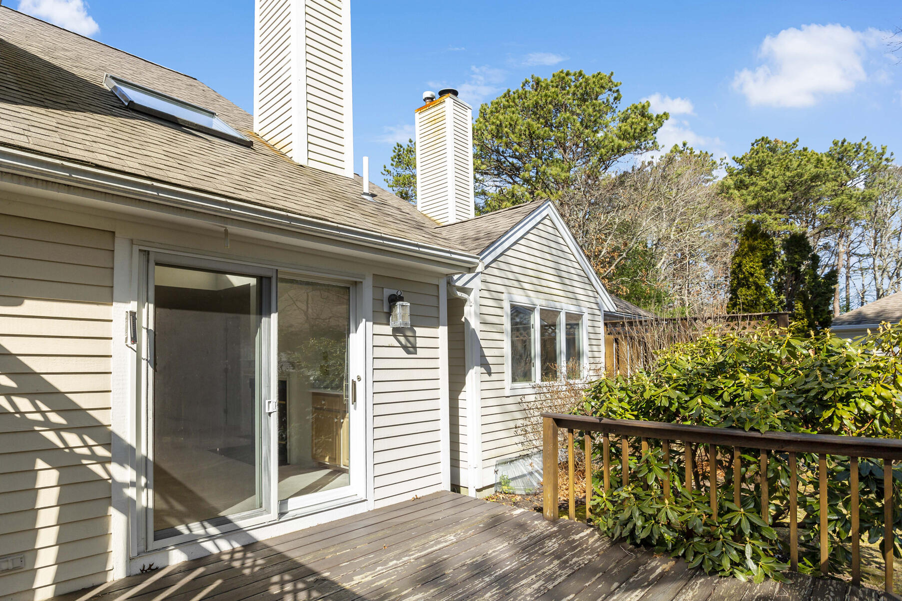 3 Kettle Lane Mashpee, MA 02649 - Photo 18 of 25 a front view of a house with a garden