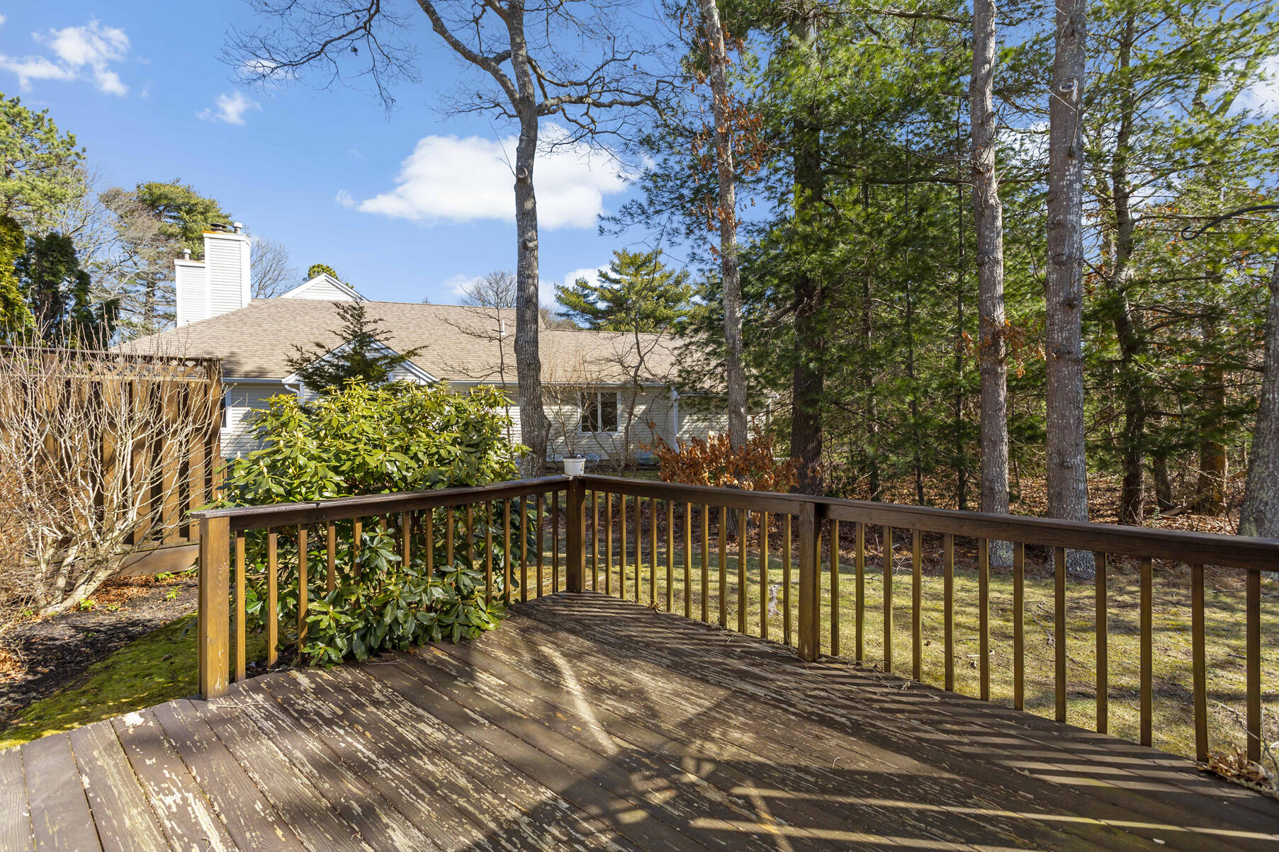 3 Kettle Lane Mashpee, MA 02649 - Photo 19 of 25 a view of a balcony with wooden floor
