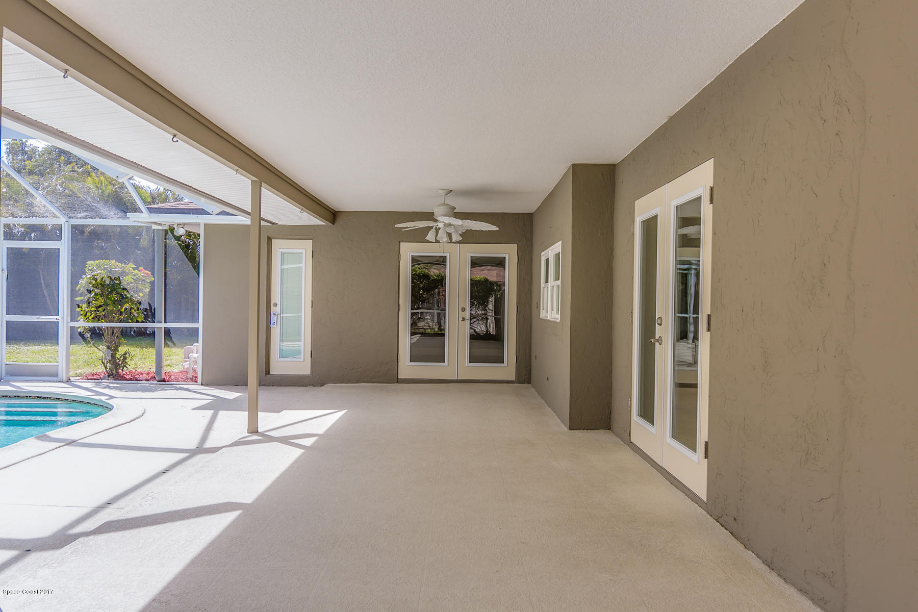 515 Rio Lane Melbourne, FL 32903 - Photo 14 of 15 a view of an entryway with a floor to ceiling window