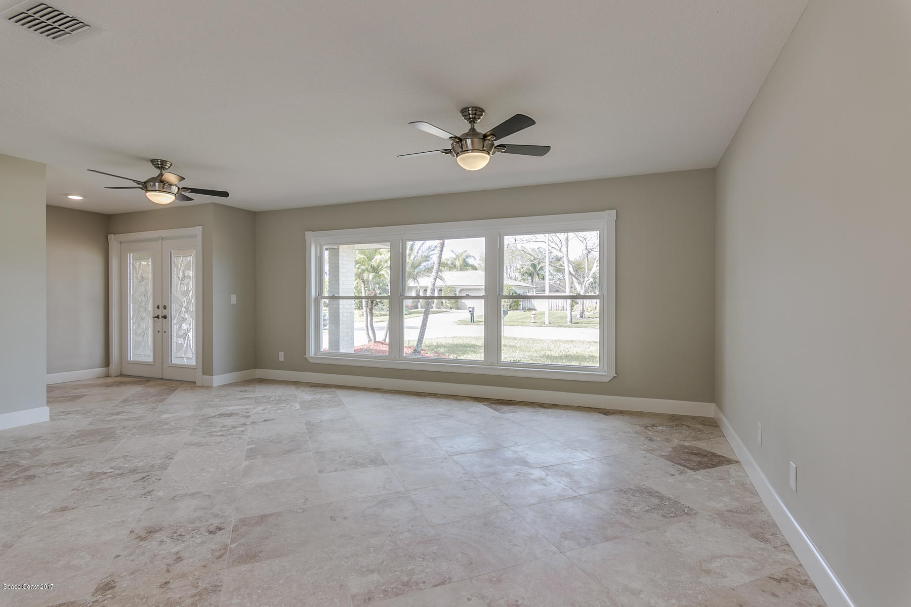 515 Rio Lane Melbourne, FL 32903 - Photo 4 of 15 a view of an empty room with a window