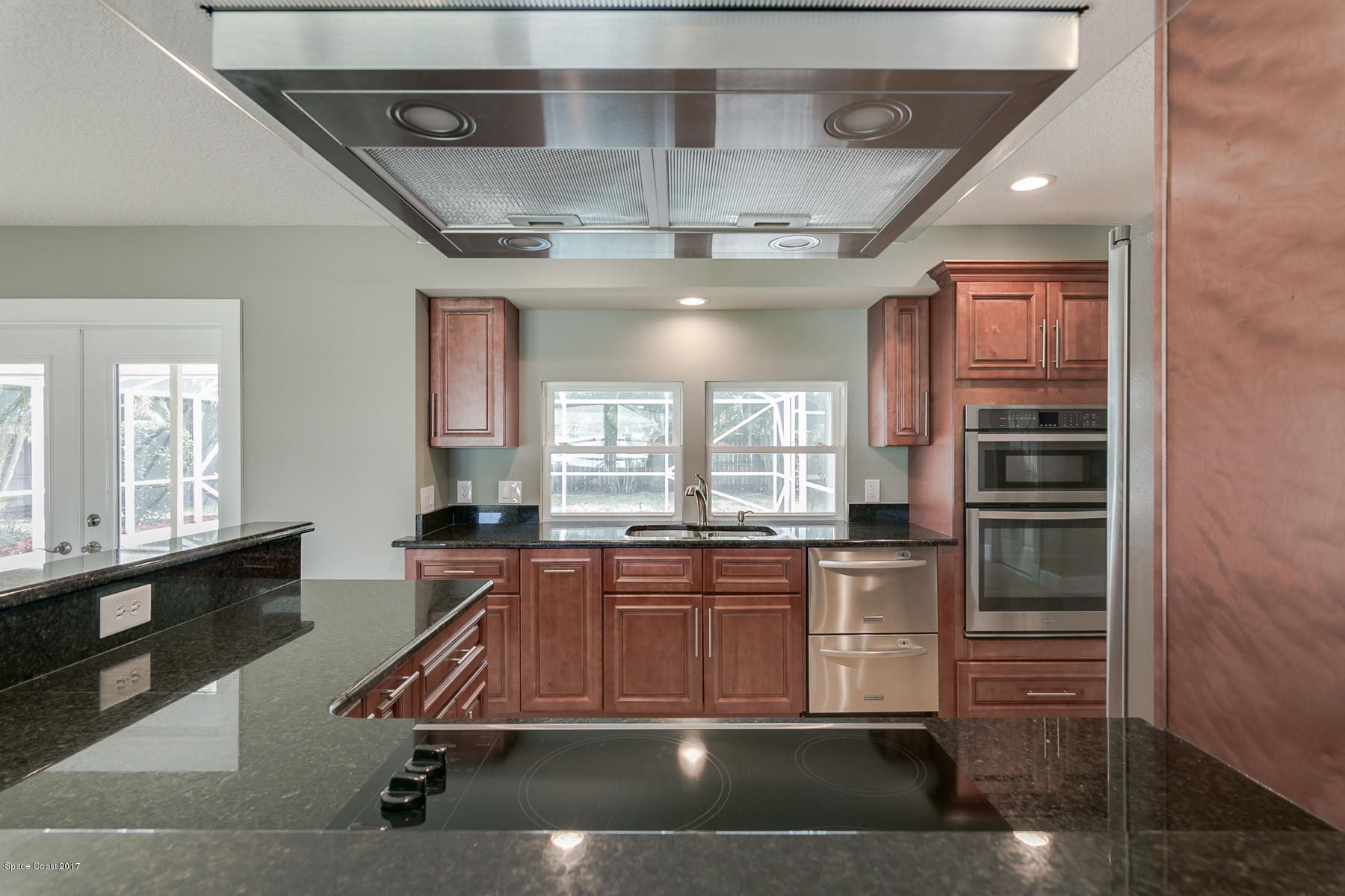 515 Rio Lane Melbourne, FL 32903 - Photo 6 of 15 a room with pool table and windows