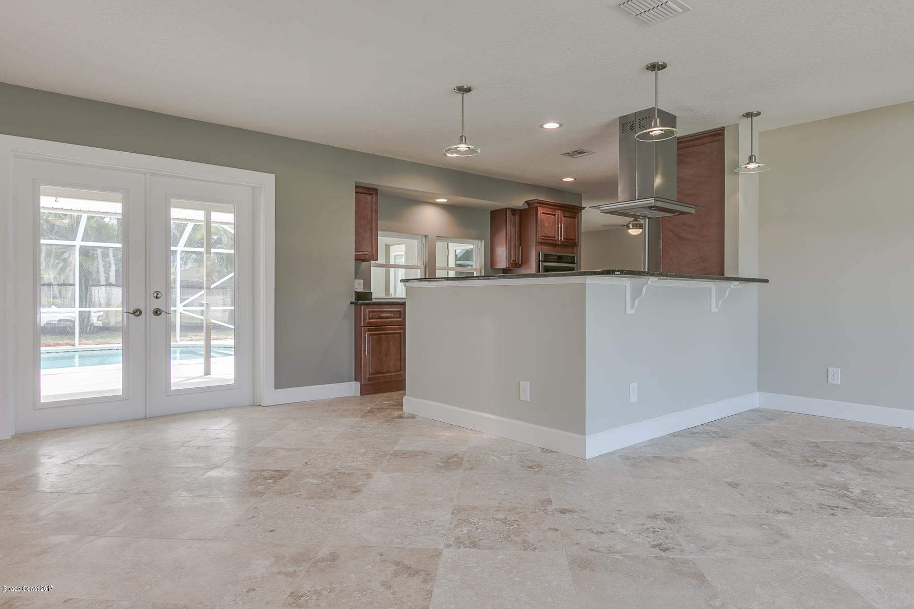 515 Rio Lane Melbourne, FL 32903 - Photo 9 of 15 a view of an empty room with kitchen and a window