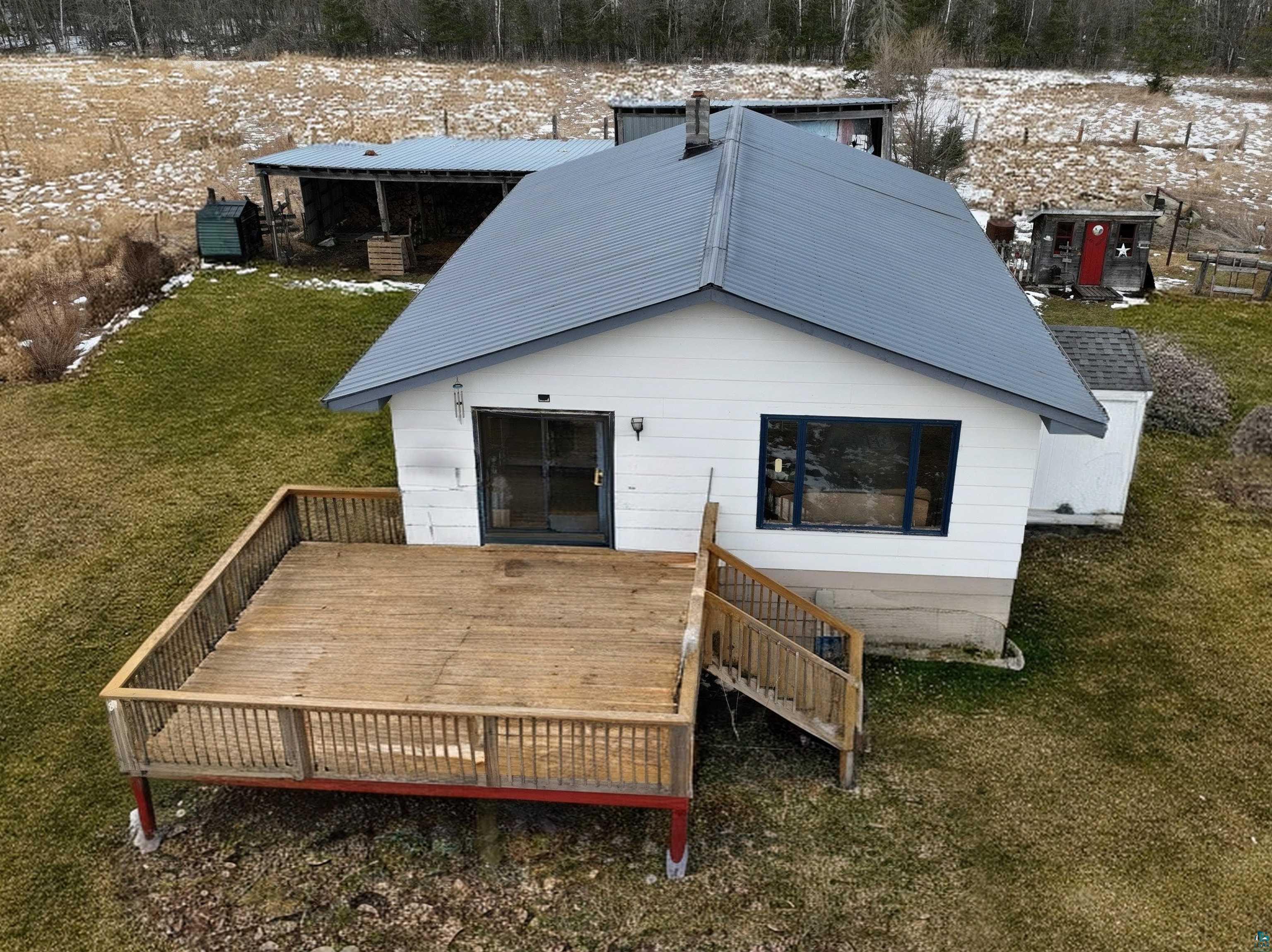 40139 County Road 251 Cohasset, MN 55721 - Photo 40 of 50 Expansive wooden deck with railing, providing outdoor living space