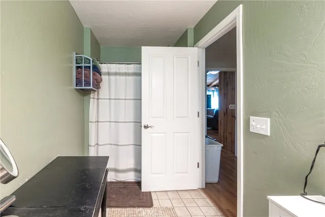 a view of kitchen with furniture and wooden floor
