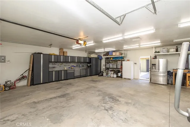 a view of a garage with gym equipment