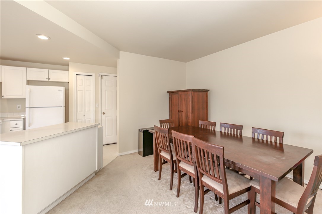 3716 Northeast 5th Place Renton, WA 98056 - Photo 13 of 29 a view of a dining room with furniture