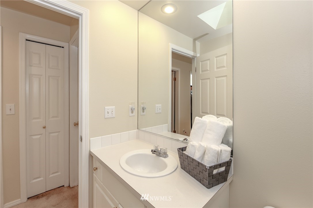 3716 Northeast 5th Place Renton, WA 98056 - Photo 20 of 29 a bathroom with a sink and a mirror