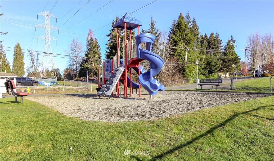 3716 Northeast 5th Place Renton, WA 98056 - Photo 27 of 29 a childrens park with lots of swings and slides