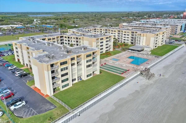 $450,000 | 4175 South Atlantic Avenue, Unit 407, New Smyrna Beach, FL 32169