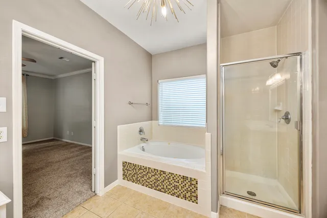 a view of an empty room with a closet