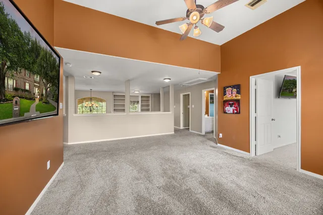 a view of a livingroom with a kitchen