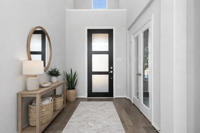 a work room with furniture and windows