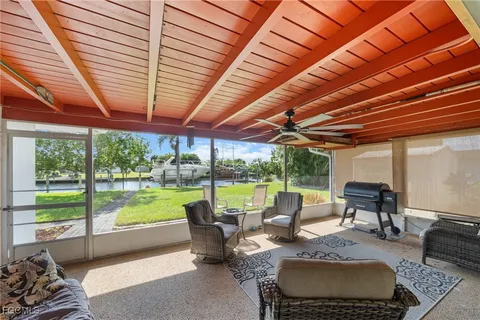a outdoor living space with furniture and garden view