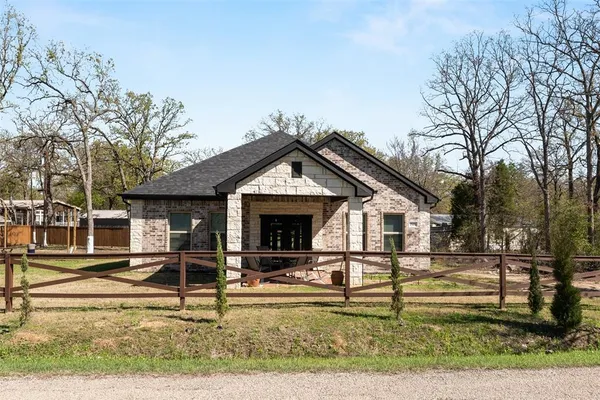 front view of a house with a small yard
