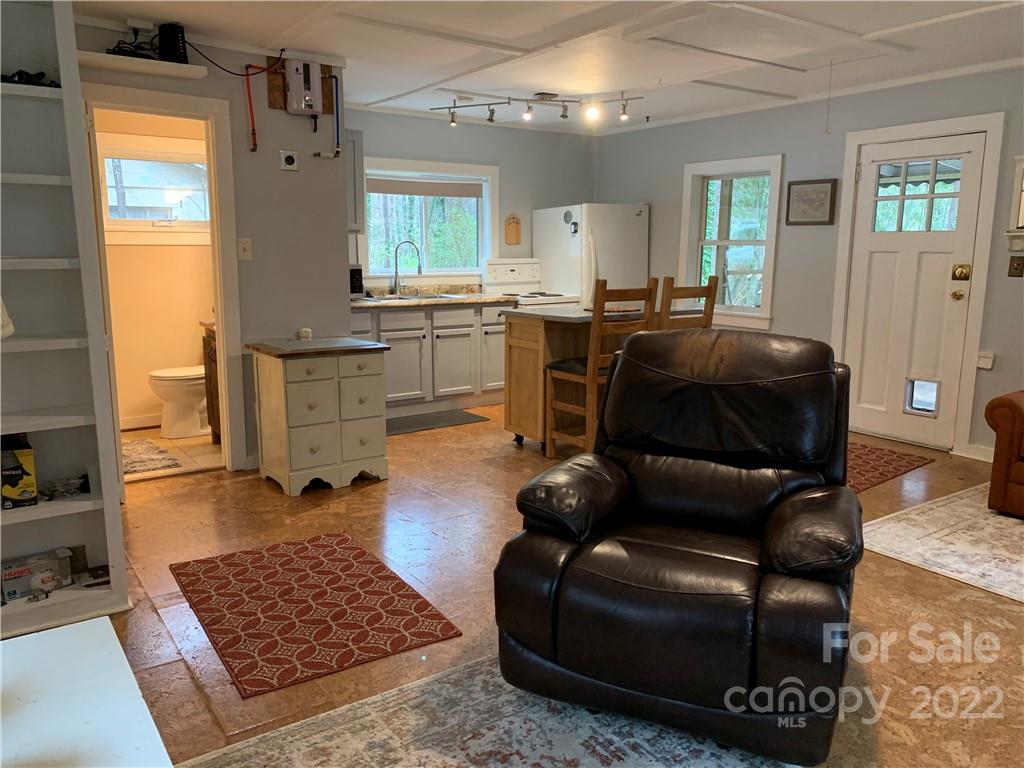 445 Autumn Lane Tryon, NC 28782 - Photo 26 of 27 a living room with furniture and a window