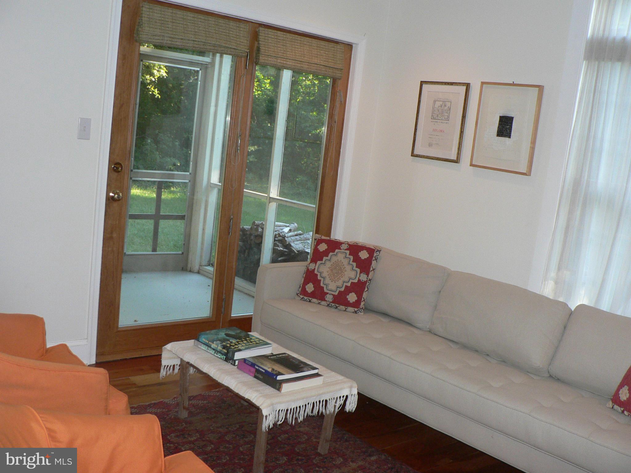 7041 Thorneton Road St. Michaels, MD 21663 - Photo 6 of 19 a living room with furniture and a window