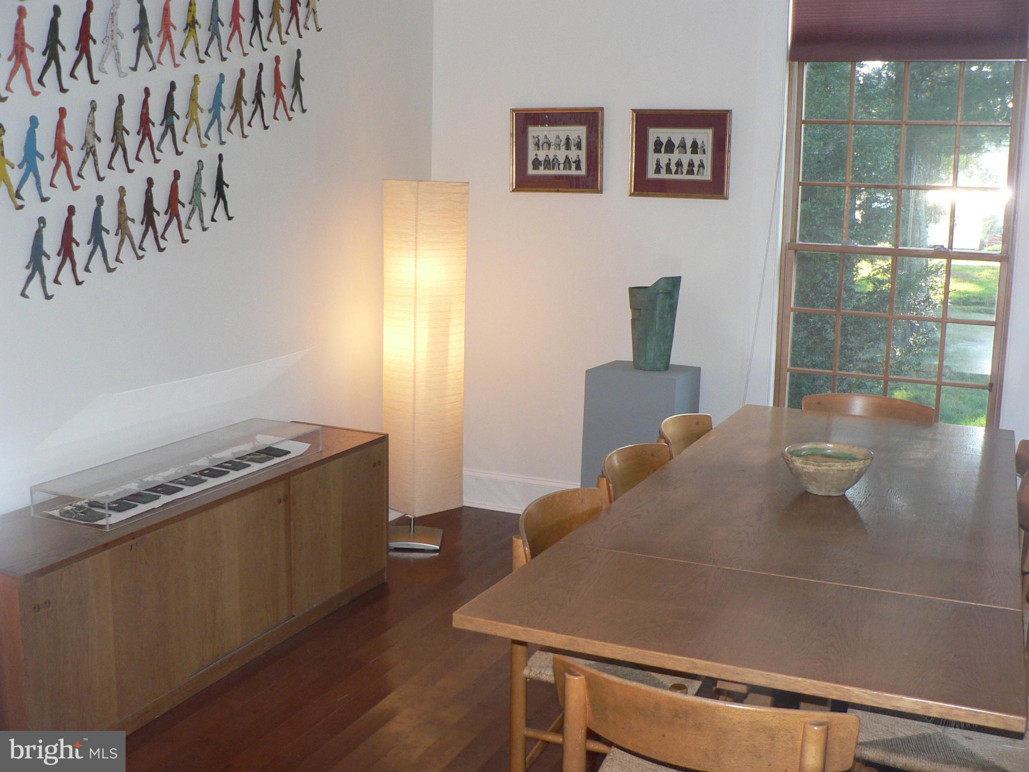 7041 Thorneton Road St. Michaels, MD 21663 - Photo 8 of 19 a kitchen with a stove and a refrigerator