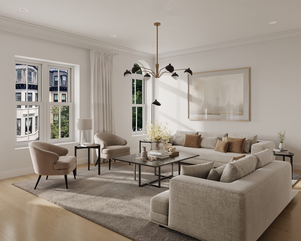 144 Worcester Street, Unit 3 Boston, MA 02118 - Photo 4 of 15 a living room with furniture and a window