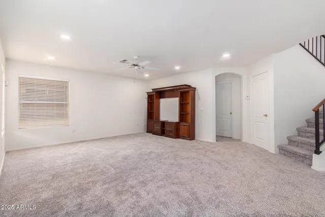 a kitchen with a sink stainless steel appliances and cabinets