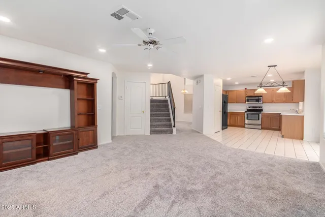 a bathroom with a sink a mirror and vanity