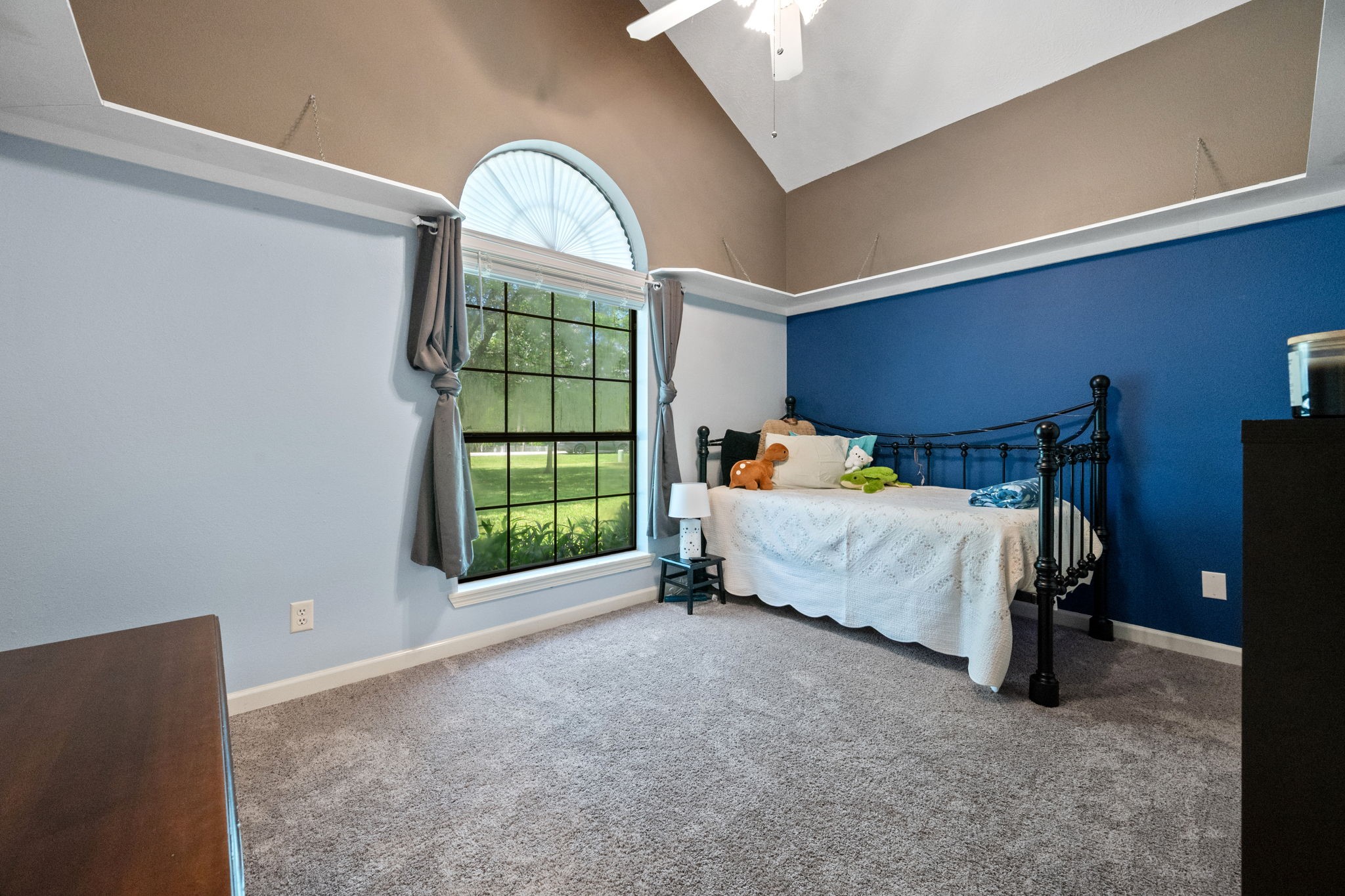 5809 Cajun Way Baytown, TX 77523 - Photo 19 of 29 a bedroom with a bed and a window