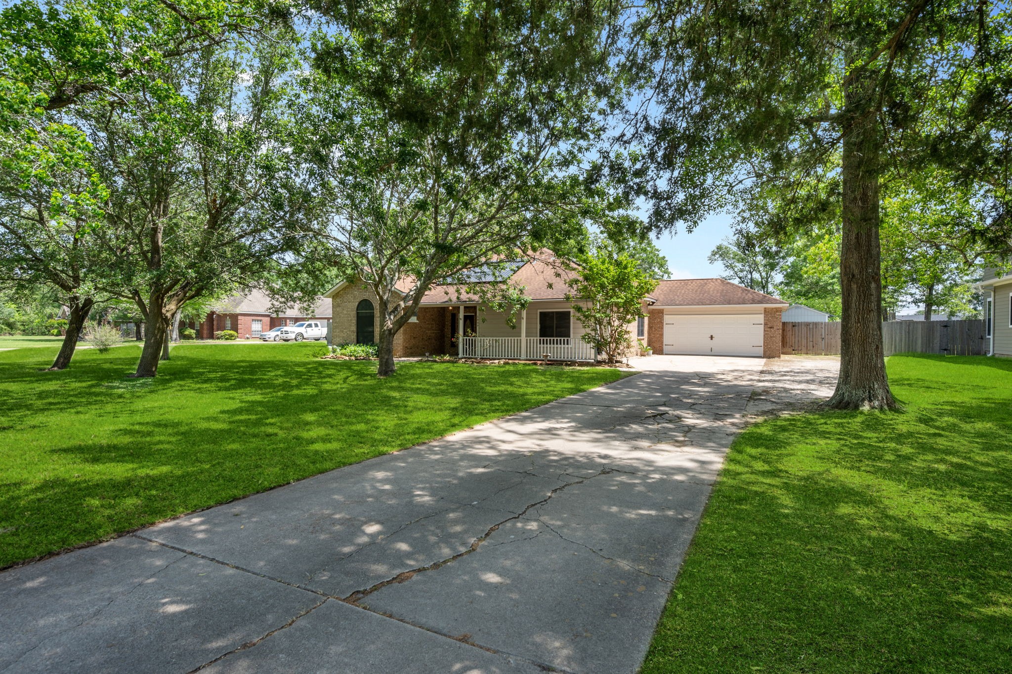 5809 Cajun Way Baytown, TX 77523 - Photo 2 of 29 a front view of a house with garden