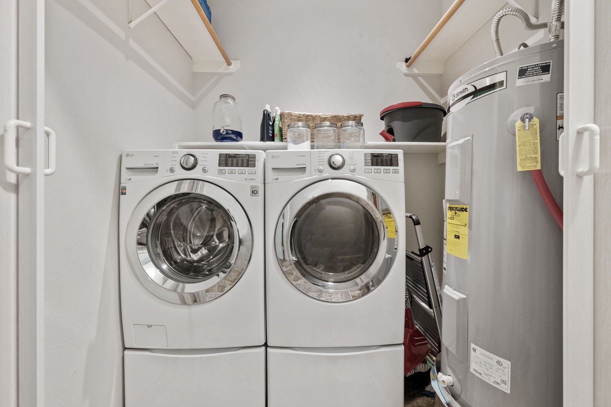 5809 Cajun Way Baytown, TX 77523 - Photo 22 of 29 a utility room with dryer and washer