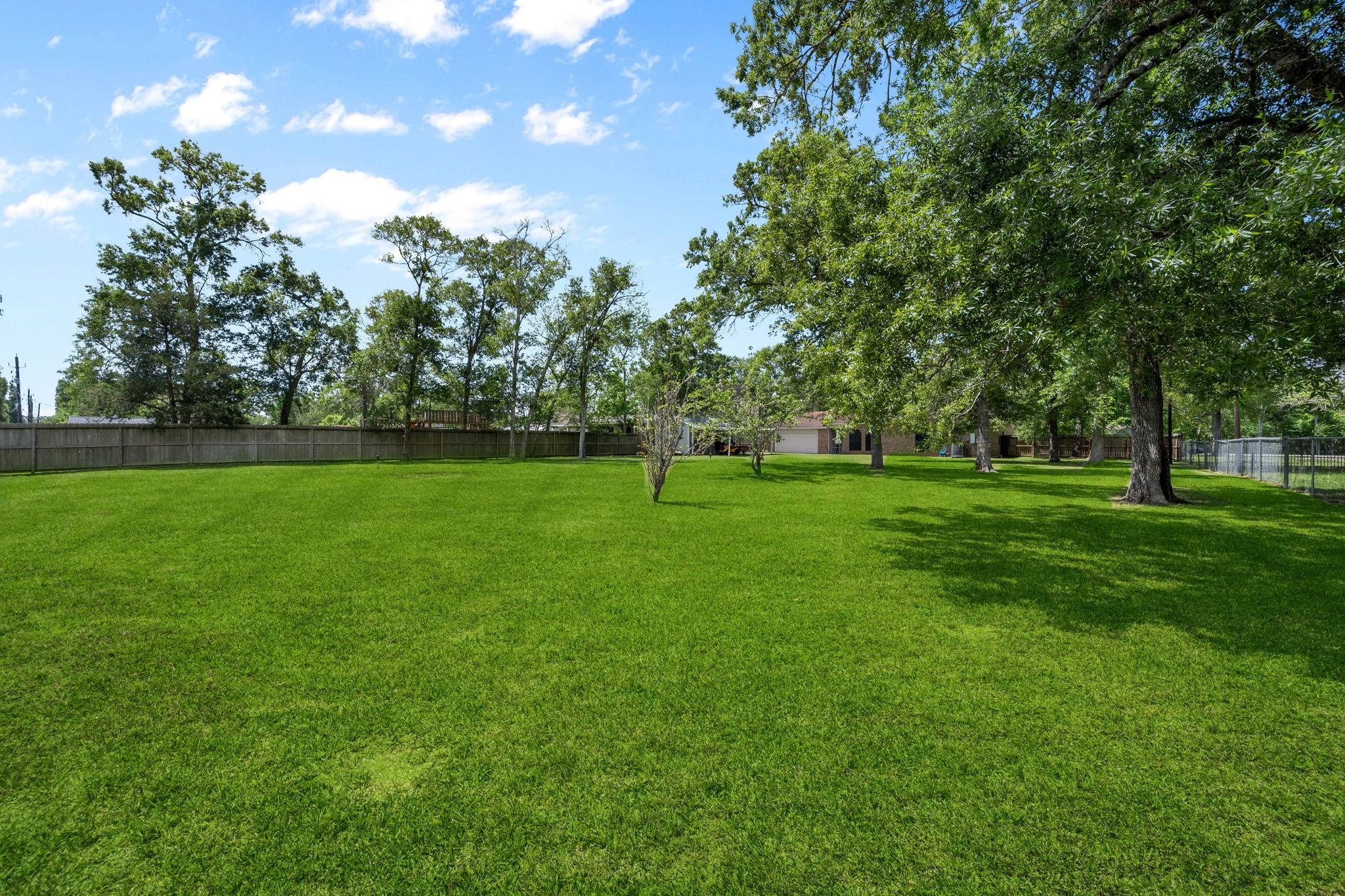 5809 Cajun Way Baytown, TX 77523 - Photo 27 of 29 a view of a park with trees in the background