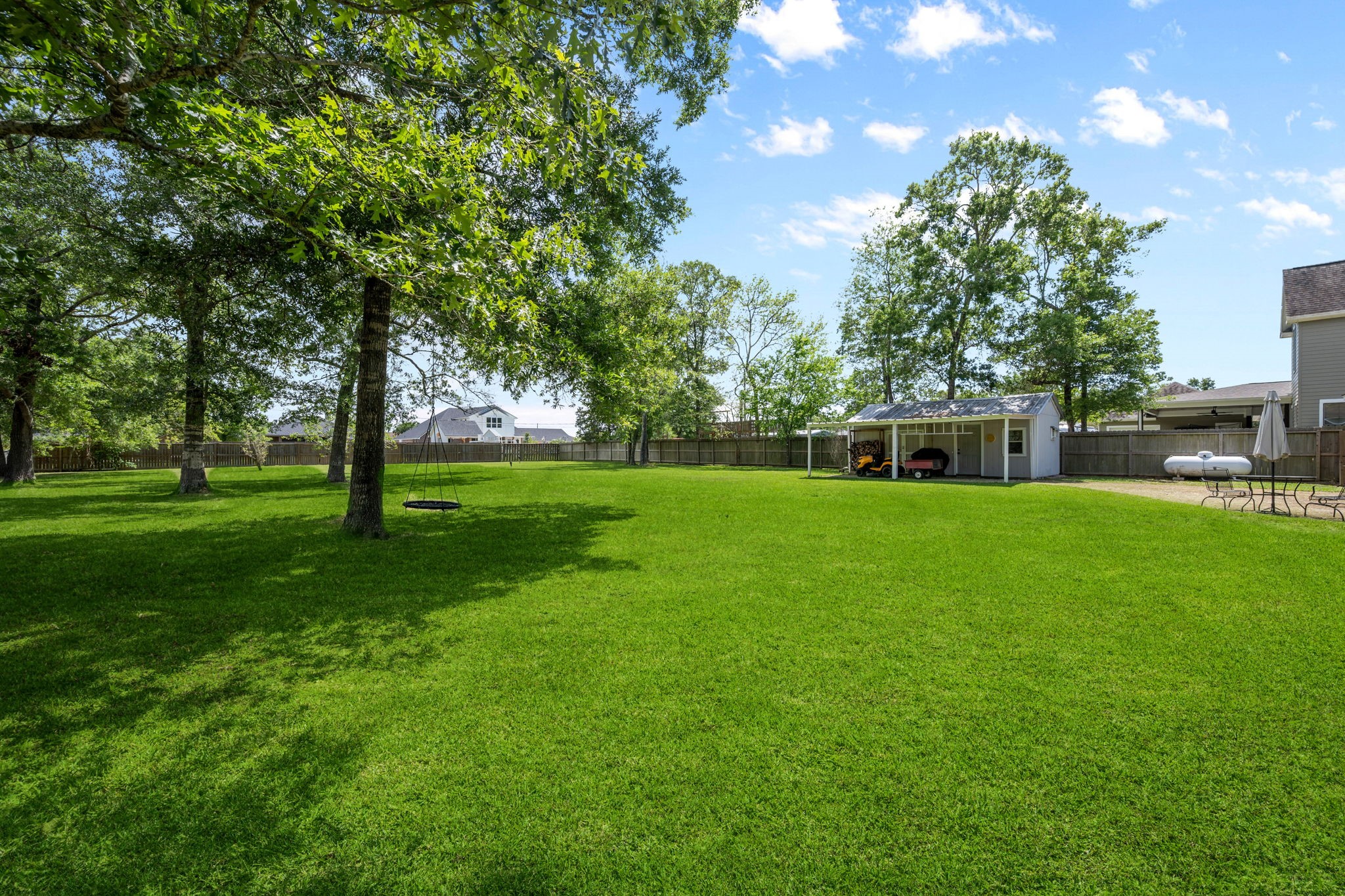 5809 Cajun Way Baytown, TX 77523 - Photo 28 of 29 a front view of a house with garden