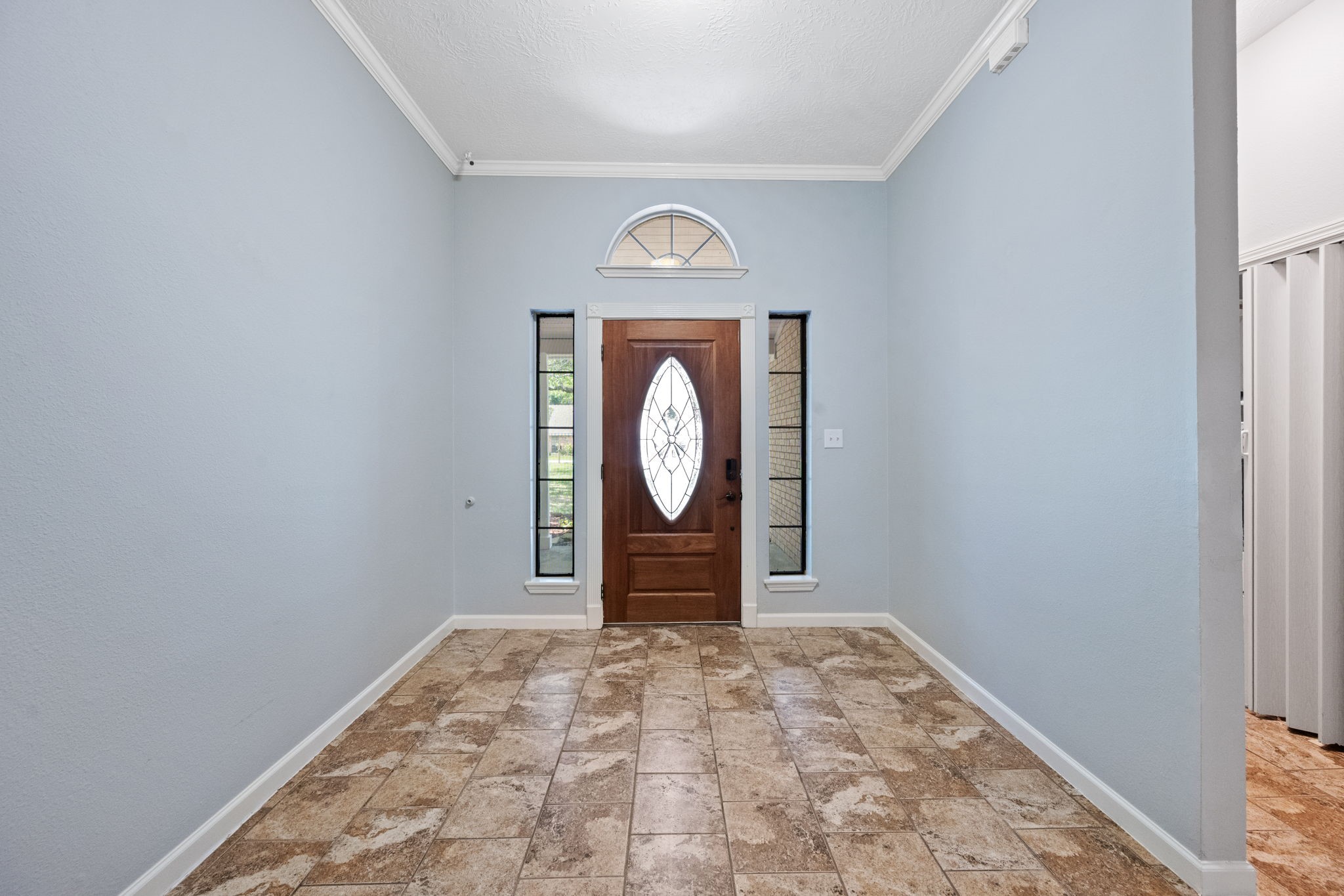 5809 Cajun Way Baytown, TX 77523 - Photo 4 of 29 a view of an entryway with wooden floor