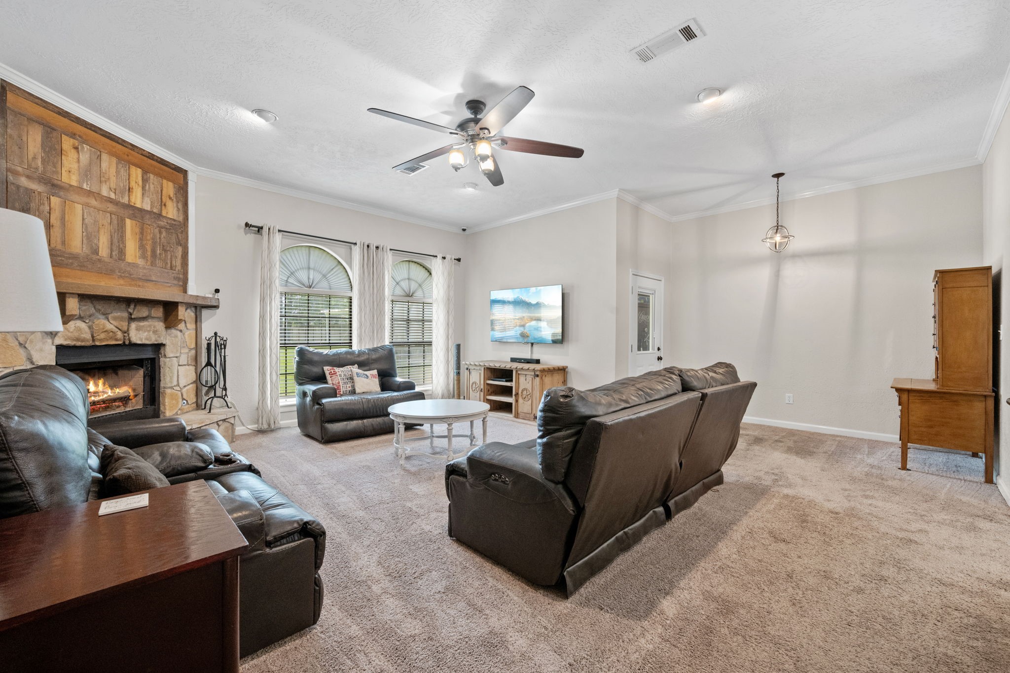 5809 Cajun Way Baytown, TX 77523 - Photo 5 of 29 a living room with furniture and a fireplace