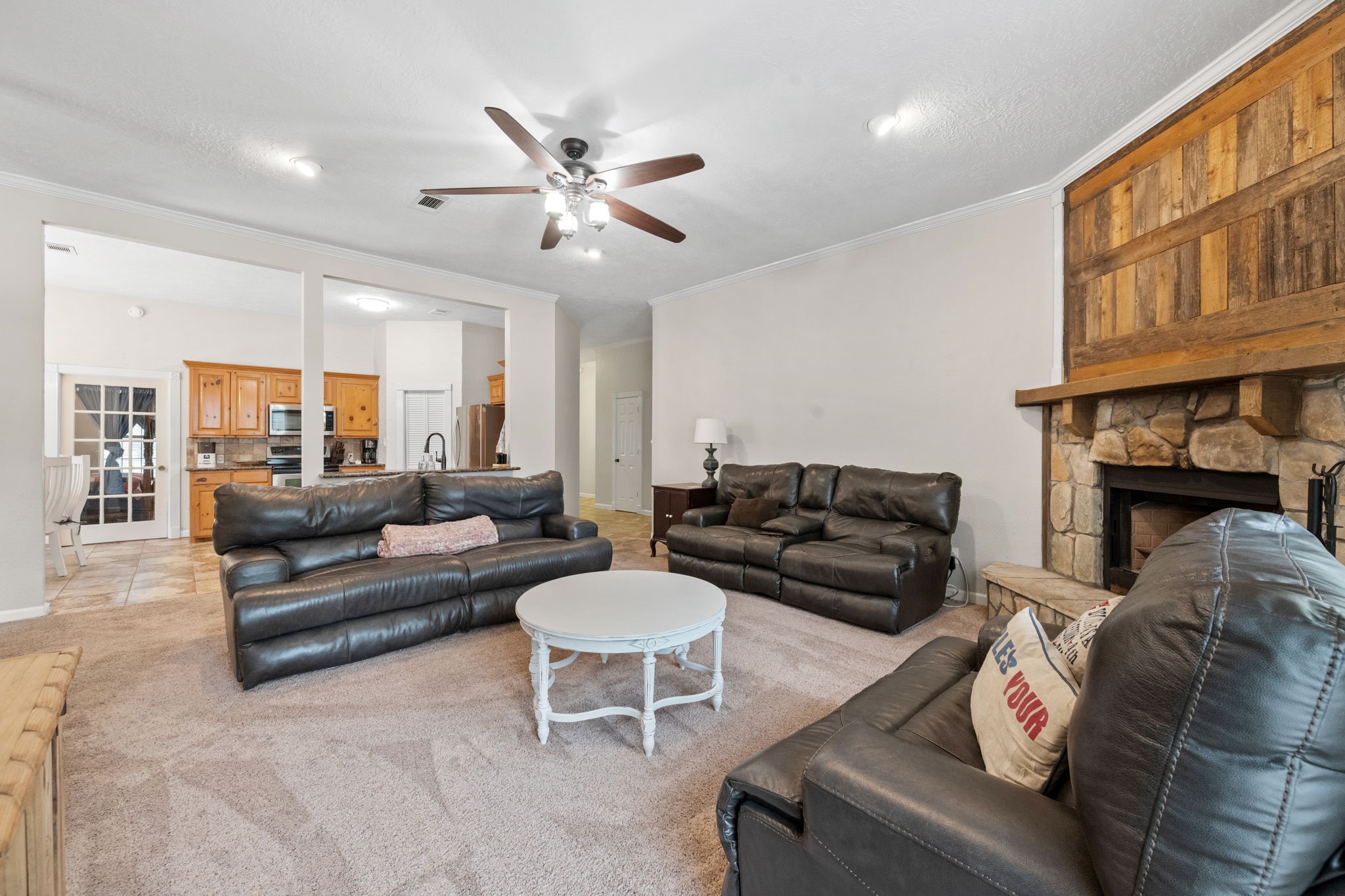 5809 Cajun Way Baytown, TX 77523 - Photo 7 of 29 a living room with furniture and a fireplace