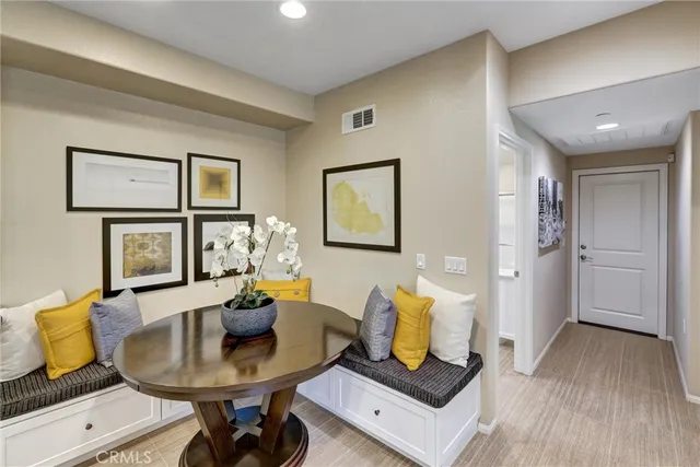 a kitchen with stainless steel appliances granite countertop a sink dishwasher stove and refrigerator