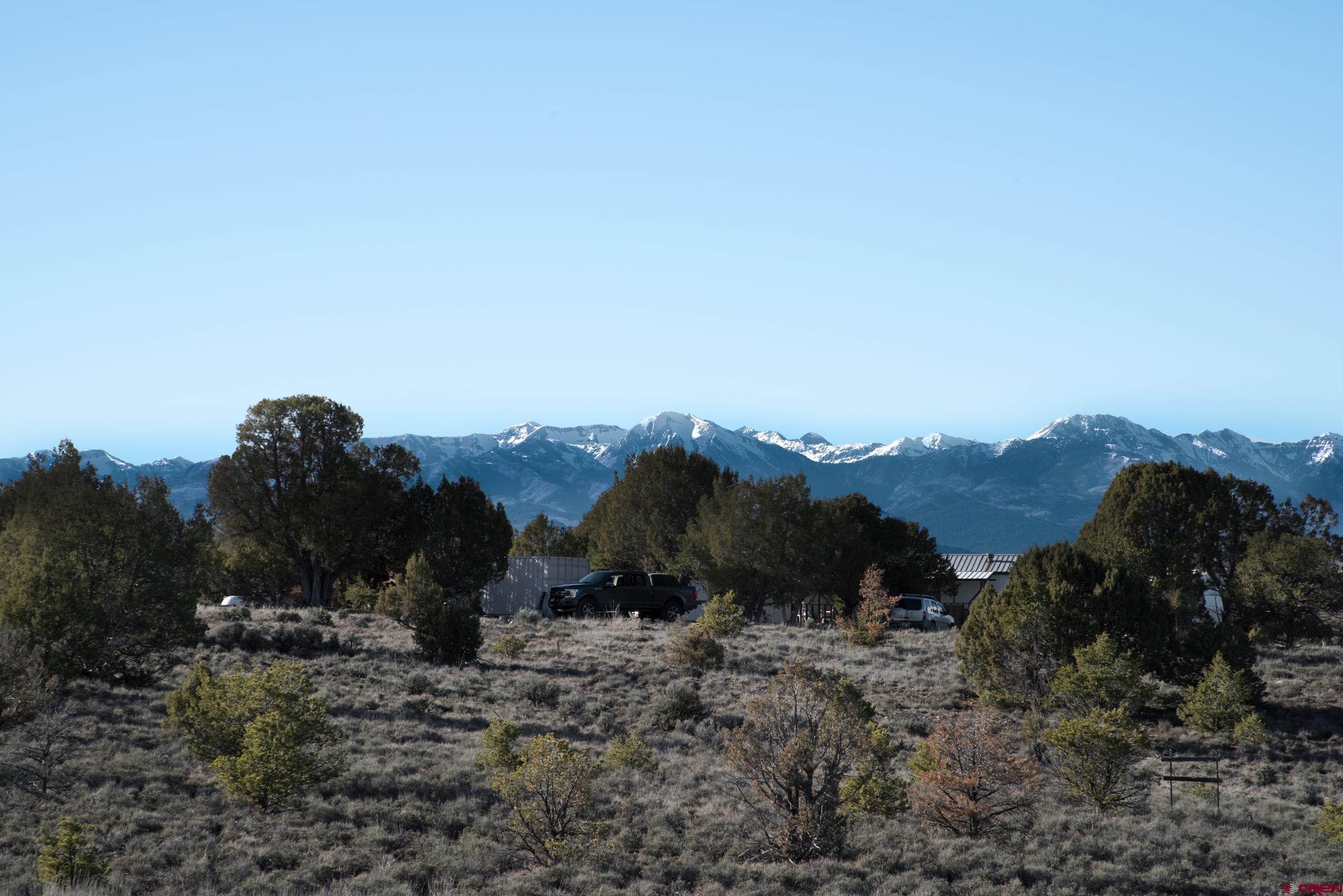 1837 Anna Road Ignacio, CO 81137 - Photo 5 of 32 a view of a large building with a mountain in the background