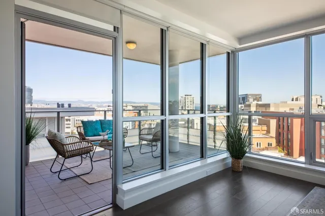 a spacious bedroom with a bed and a couch