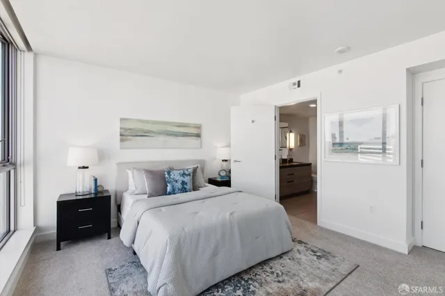 a bathroom with a shower and toilet