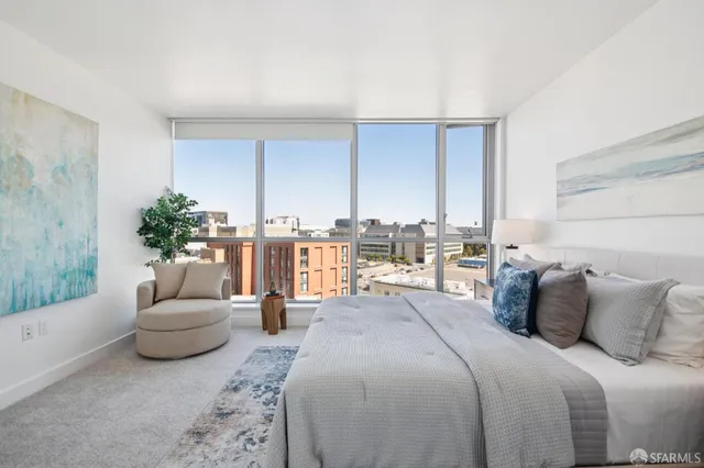 a en suite bathroom with double sink and a mirror