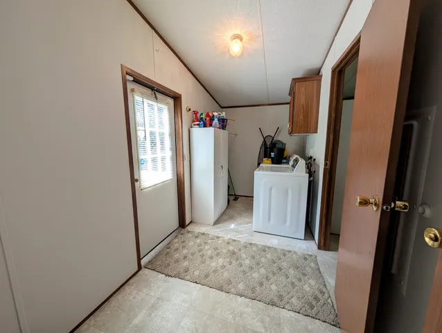 a view of a storage and utility room