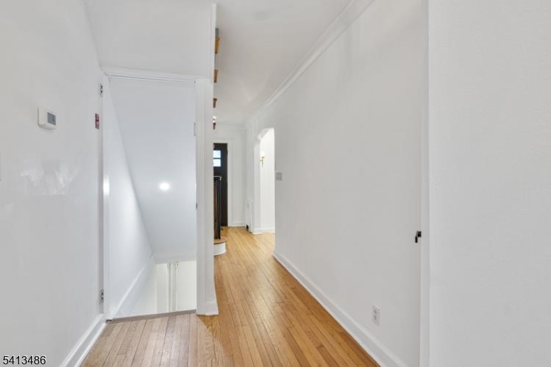 224 Swarthmore Road Linden, NJ 07036 - Photo 16 of 33 a view of hallway with wooden floor