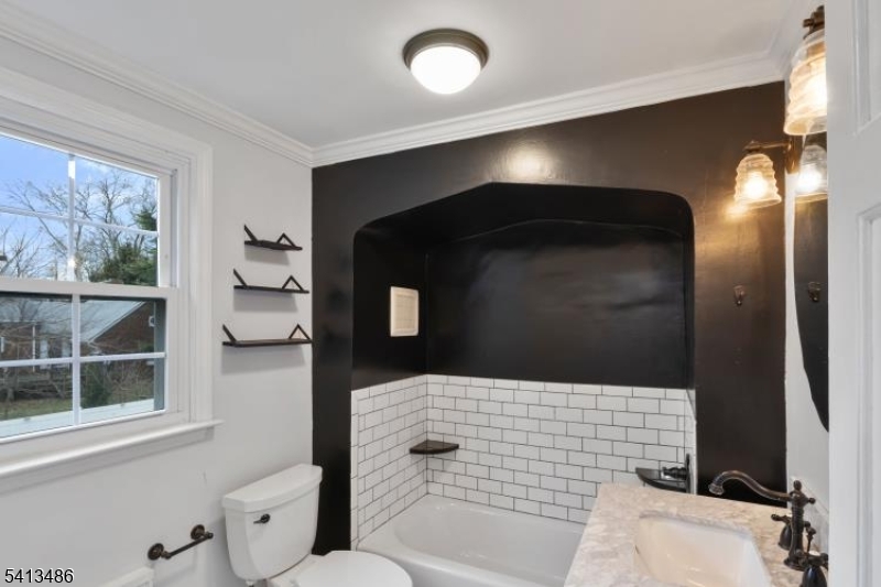 224 Swarthmore Road Linden, NJ 07036 - Photo 23 of 33 a bathroom with a shower and a sink