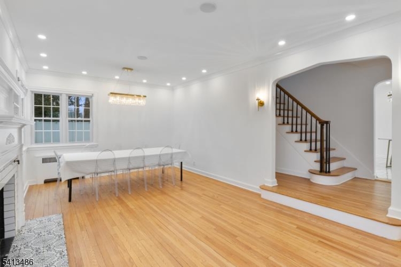224 Swarthmore Road Linden, NJ 07036 - Photo 8 of 33 a view of an empty room with wooden floor and a window