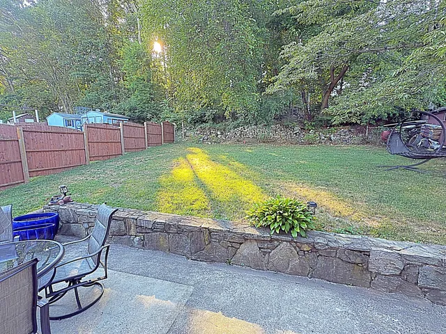 a view of a swimming pool with a lounge chairs