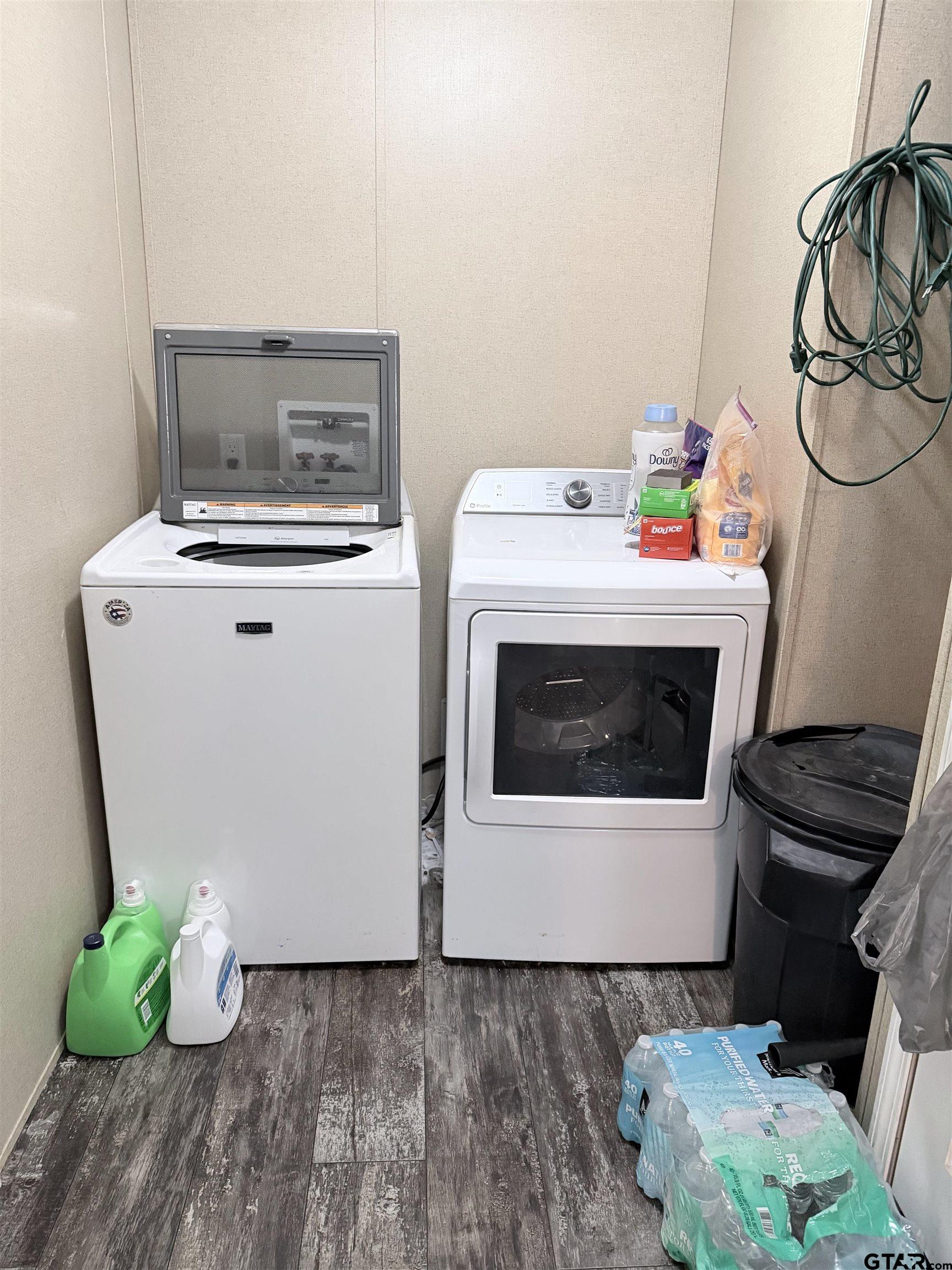 11300 Highway 271, Unit 52 Tyler, TX 75708 - Photo 5 of 16 a utility room with dryer and washer