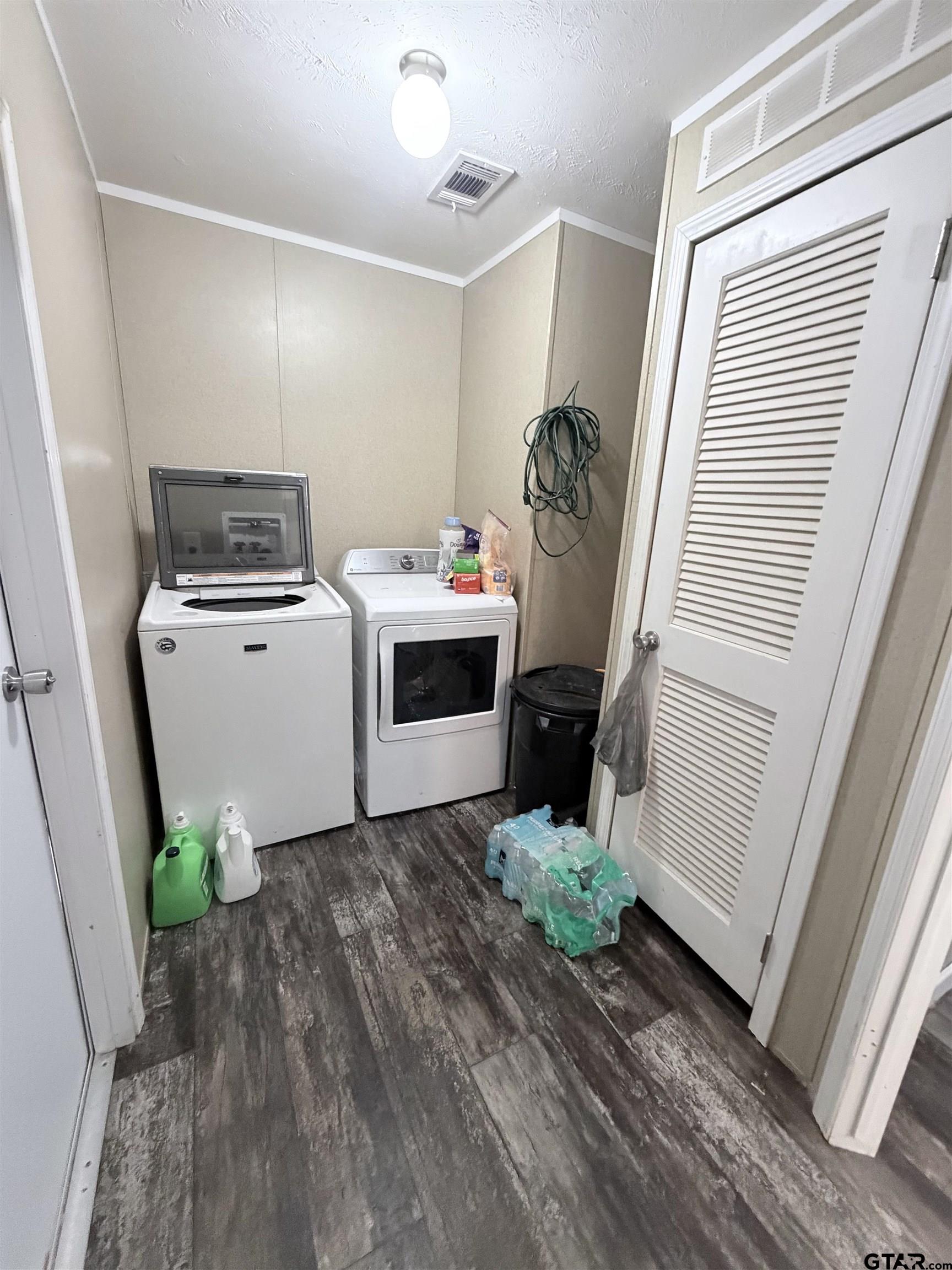 11300 Highway 271, Unit 52 Tyler, TX 75708 - Photo 6 of 16 a room with storage and utility