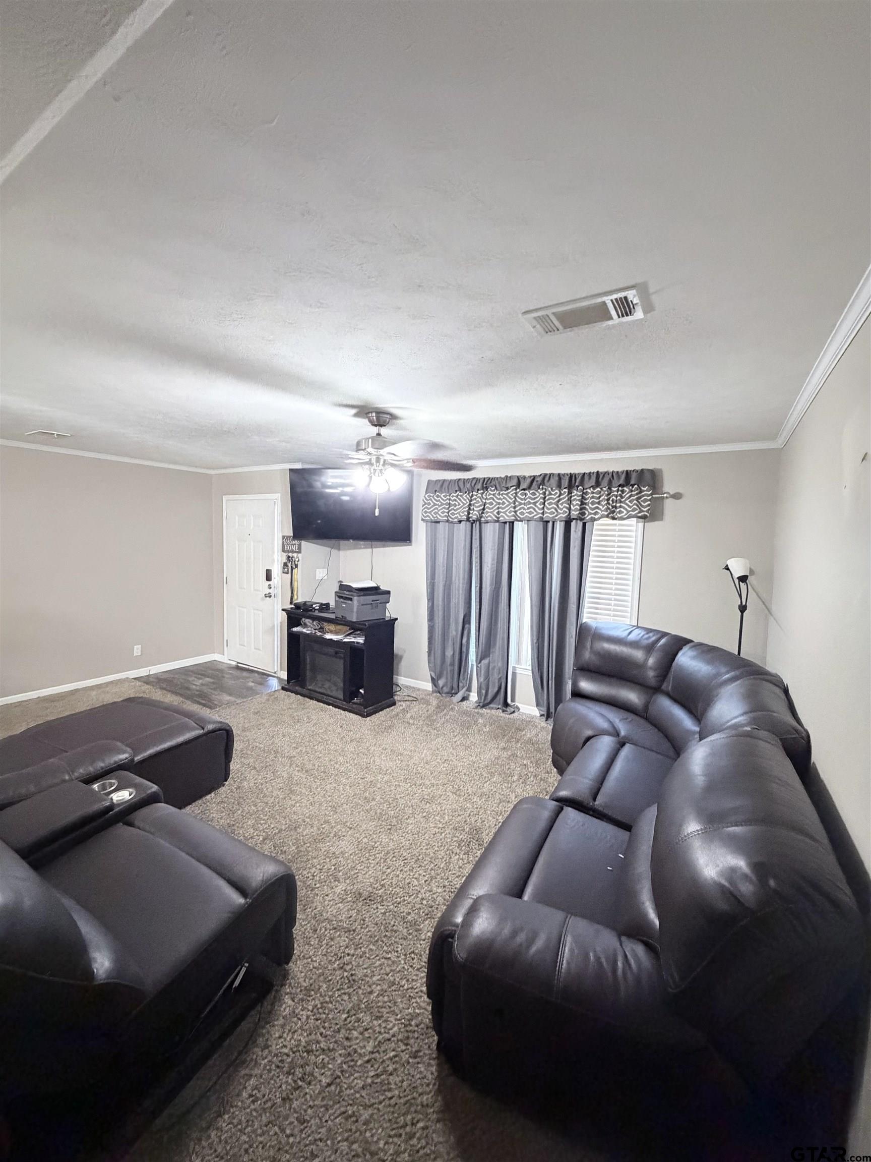 11300 Highway 271, Unit 52 Tyler, TX 75708 - Photo 9 of 16 a living room with furniture