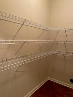 a view of a room with racks on the wall