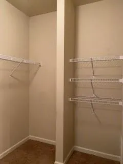 a view of a room with racks on the wall