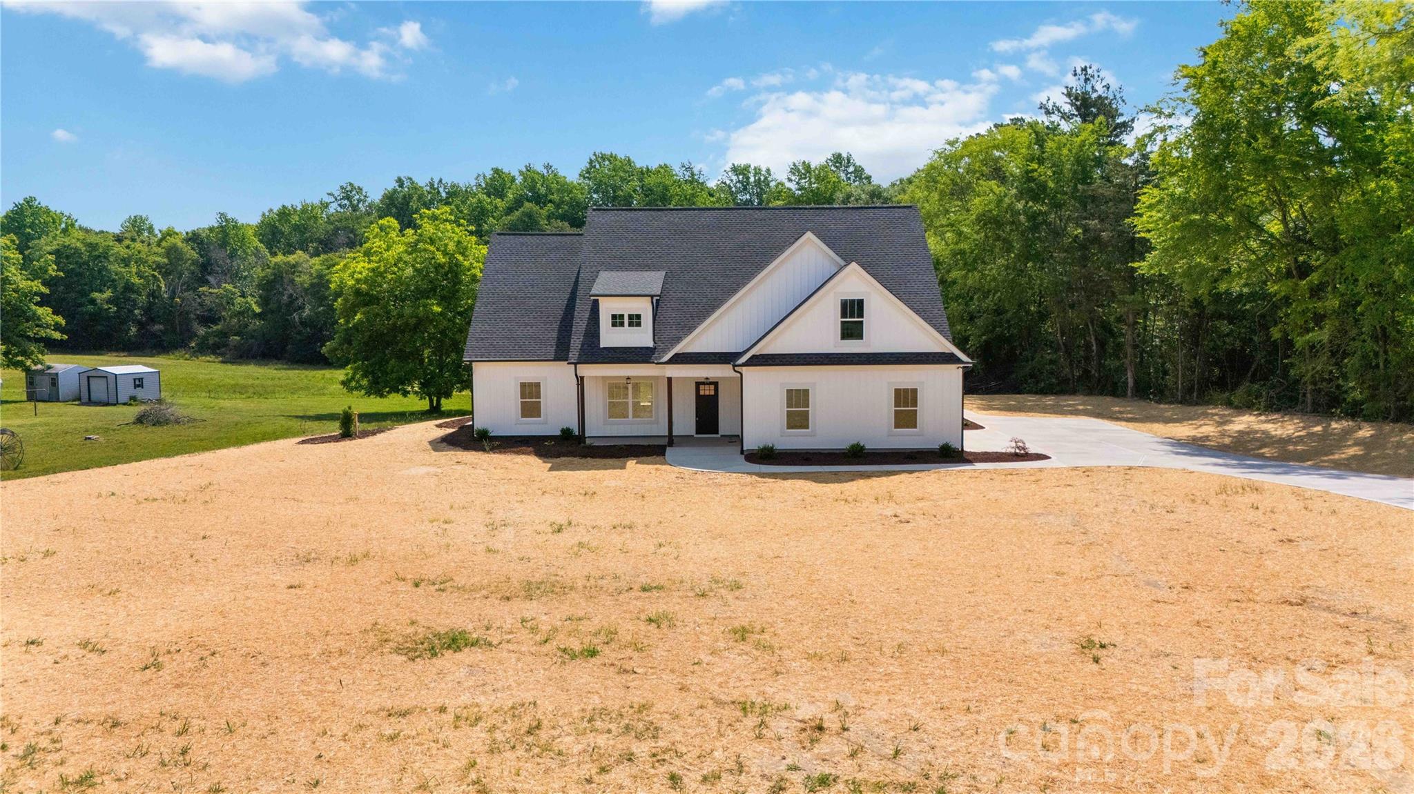 352 Adams Road Clover, SC 29710 - Photo 31 of 38 a house with a yard